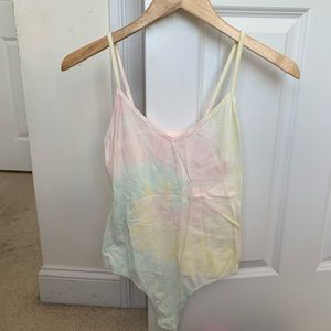 light tie dye body suit from PacSun
